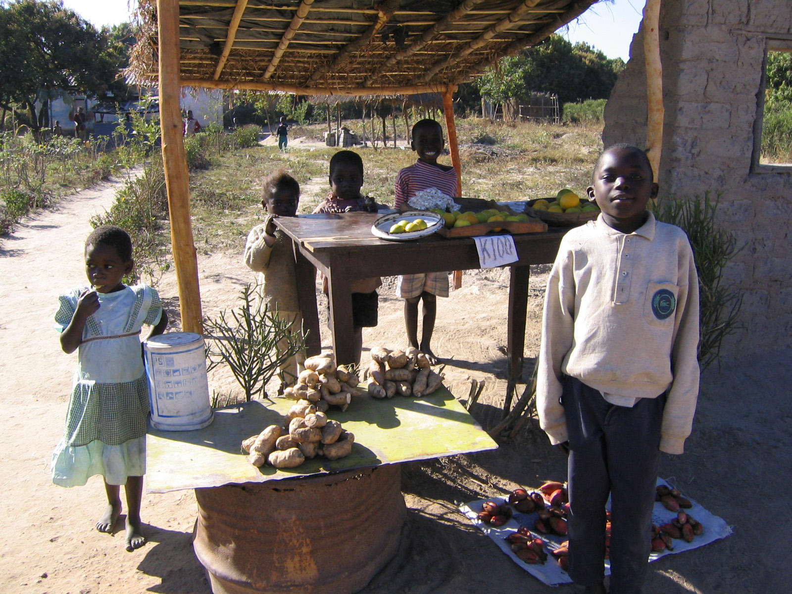 A young shop owner in Zambia. © 2004 James Jack, Courtesy of Photoshare