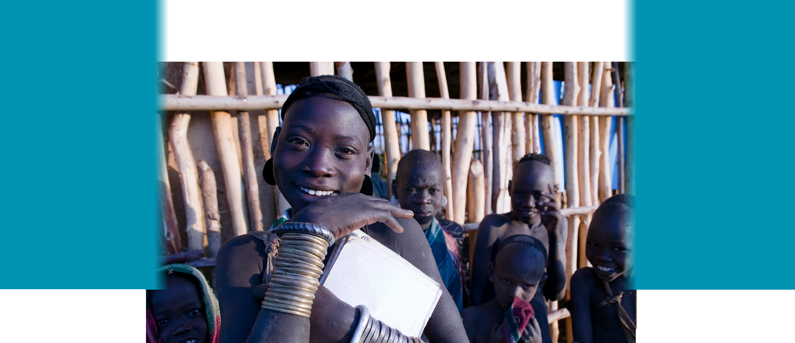 A young girl outside a schoolhouse in Ethiopia. Photo credit: Susan Liebold